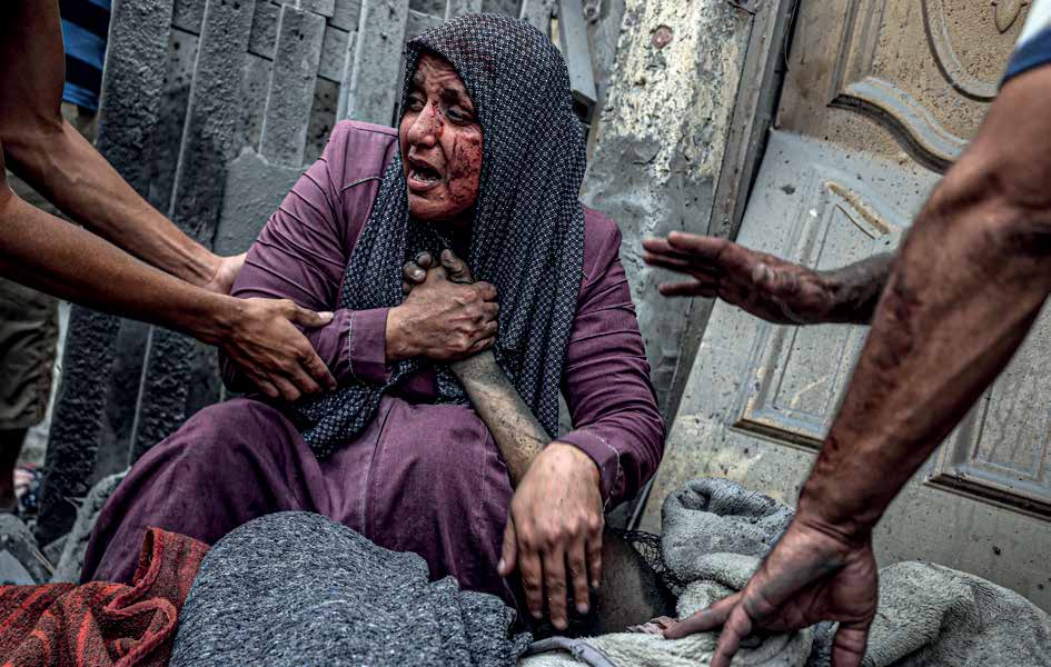 فلسطيني قُتل في الغارات الجوية التي شنتها القوات الإسرائيلية على حي الرضوان في مدينة غزة بتاريخ 23 أكتوبر/ تشرين الأول 2023.