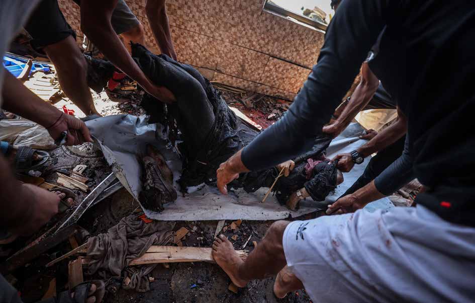 An Israeli airstrike targeting a beachfront café in Gaza killed and injured numerous Palestinians. The attack took place in a densely populated area of the city.