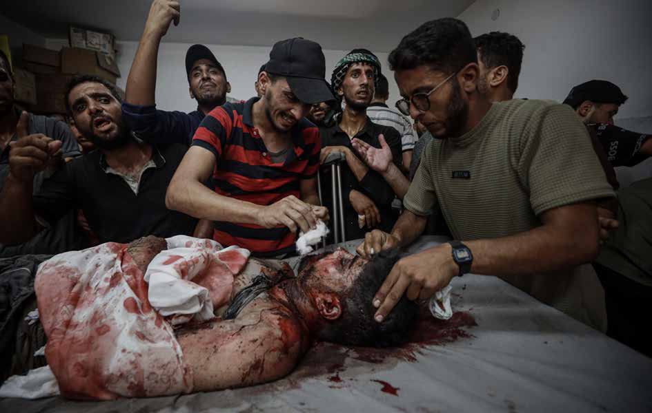 Israeli forces reportedly killed at least 54 Palestinians in attacks across various parts of the Gaza Strip. In Gaza City’s Shati Refugee Camp, an airstrike on the Abu Asi school—where displaced Palestinians had taken shelter—killed seven people, including children. The bodies of those killed in the strike have been brought to al-Shifa Hospital.