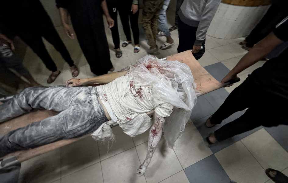 The bodies of Palestinians killed in an Israeli strike on a group waiting for flour aid in the Asda area have been brought to Nasser Hospital in Khan Younis, southern Gaza.