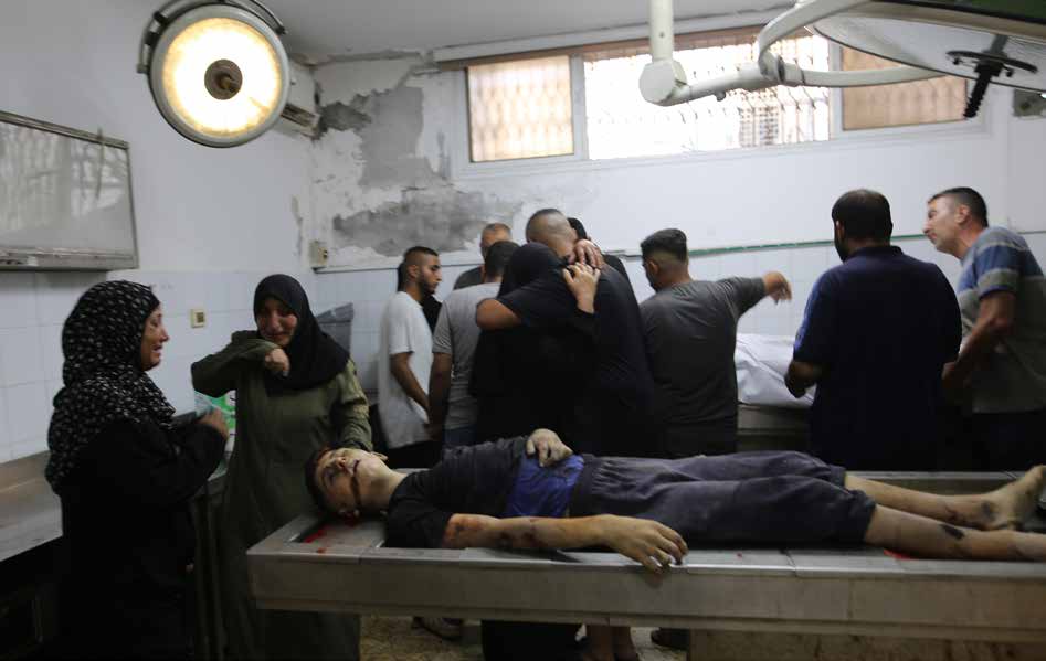 The bodies of Palestinians, including children, killed in Israeli strikes on the Jabalia Camp in northern Gaza have been brought to al-Shifa Hospital. Grieving relatives mourn the loss of their loved ones.