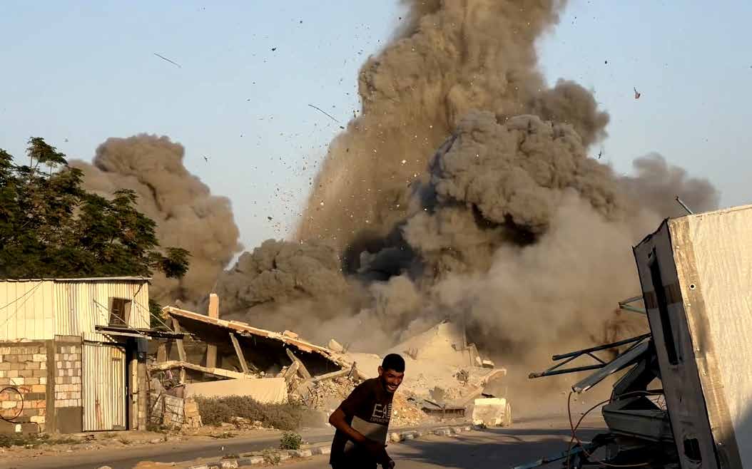 The Israeli military targets the home of the al-Sus family in the Bureij Refugee Camp in central Gaza.